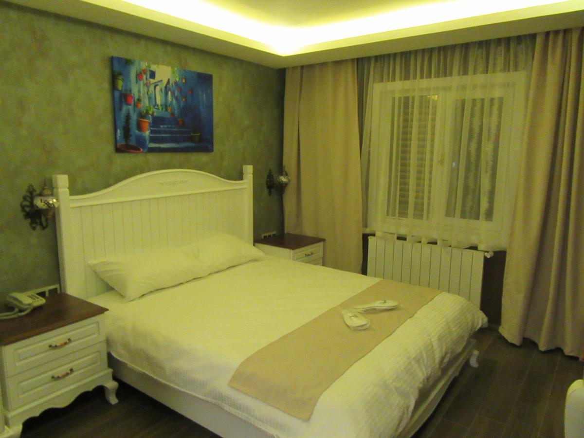 Trilye Kaplan Hotel มูดานยา ภายนอก รูปภาพ